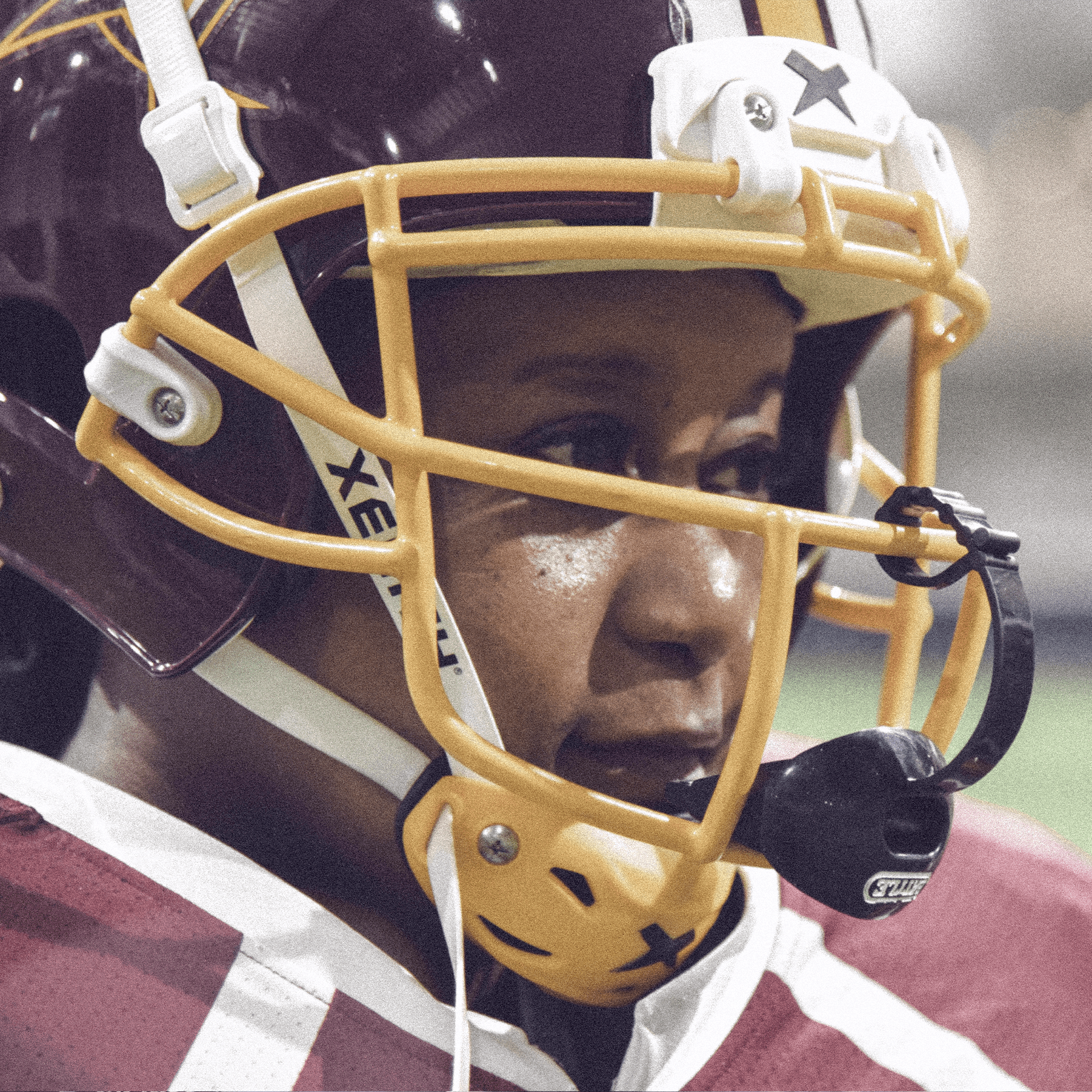 Close up of woman wearing a Xenith football helmet.