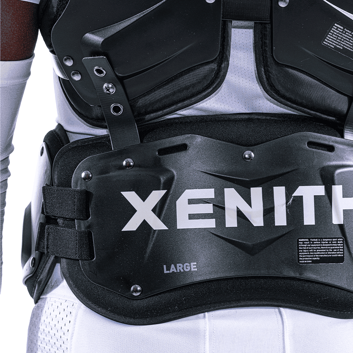 Color::black | Black Xenith back plate with white Xenith logo.