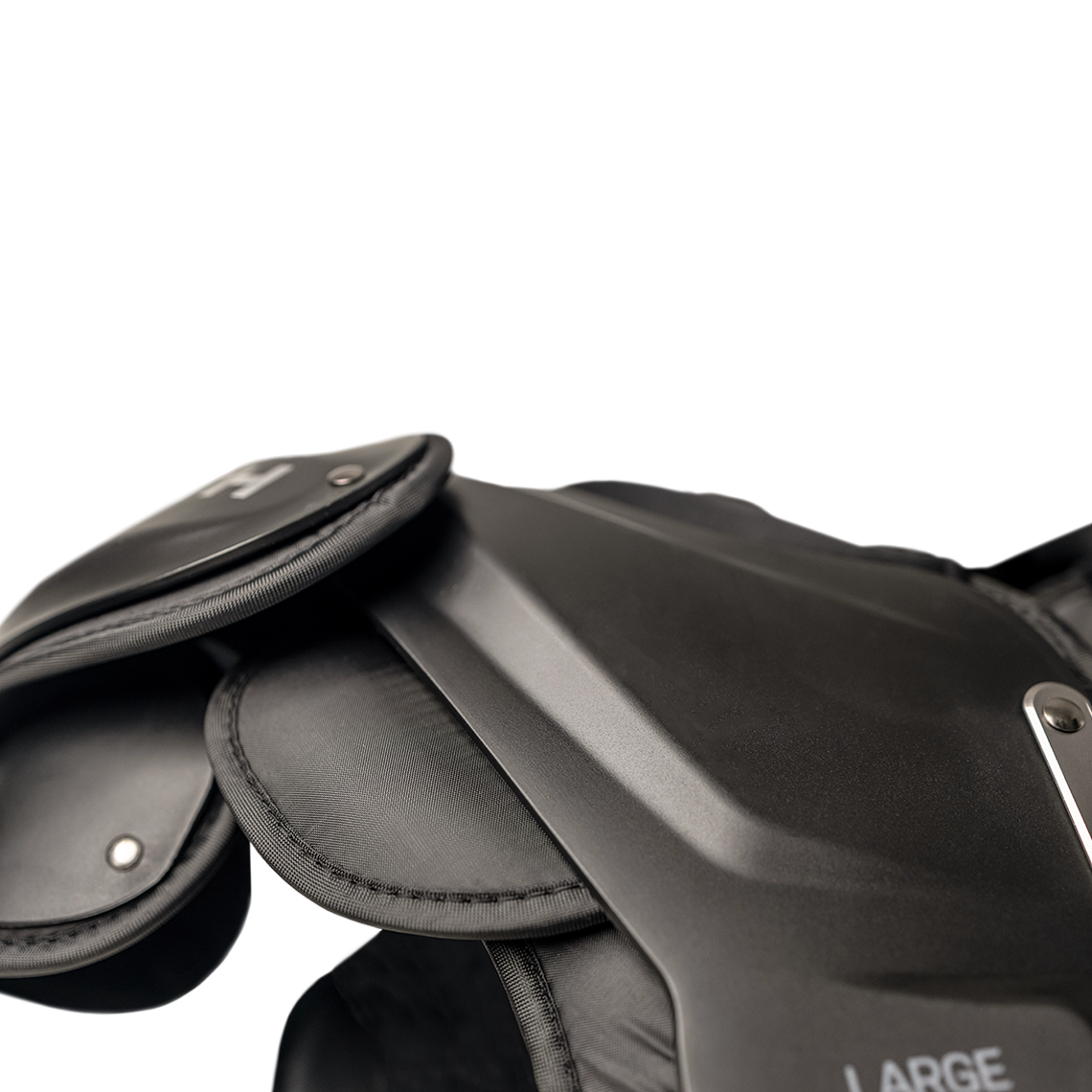 Black Velocity Pro Light shoulder pads zoomed in shoulder.