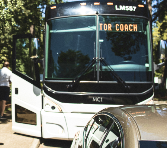 Front facing view of a tour bus.