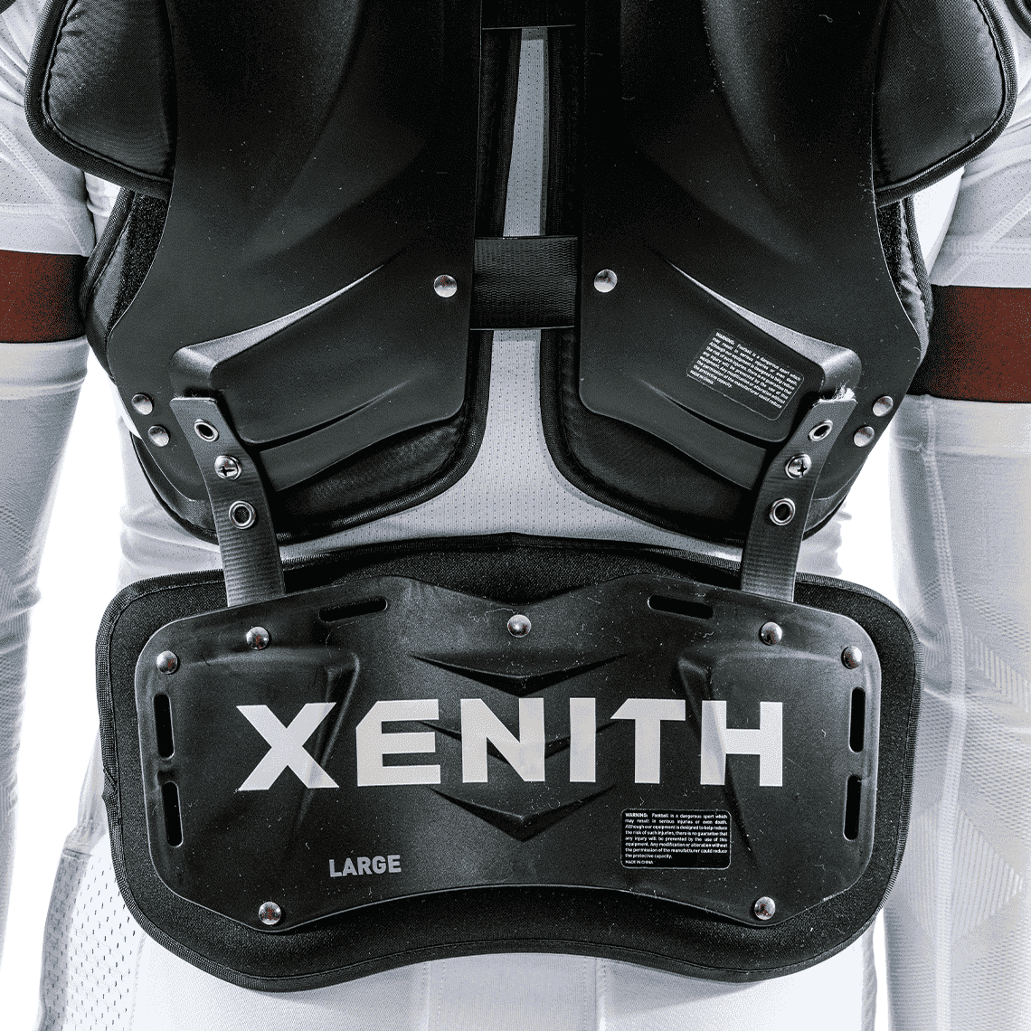 Color::black | Black Xenith back plate with white Xenith logo.