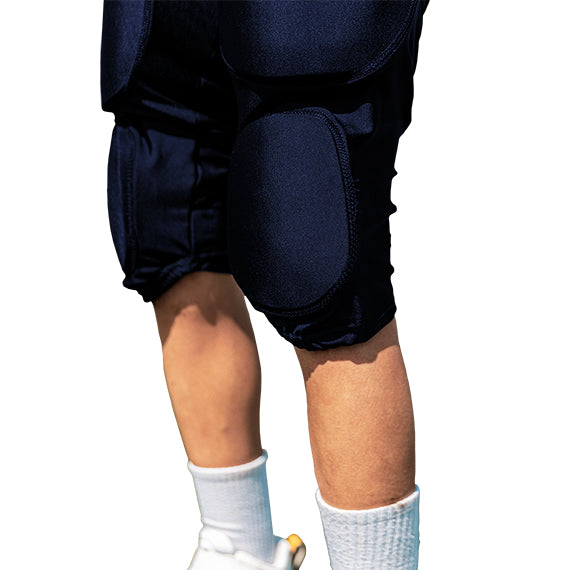 Color::navy | Navy integrated pants from front on youth male model