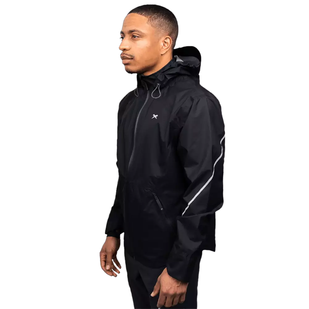 Male model wearing black rainjacket with reflective details, from front.