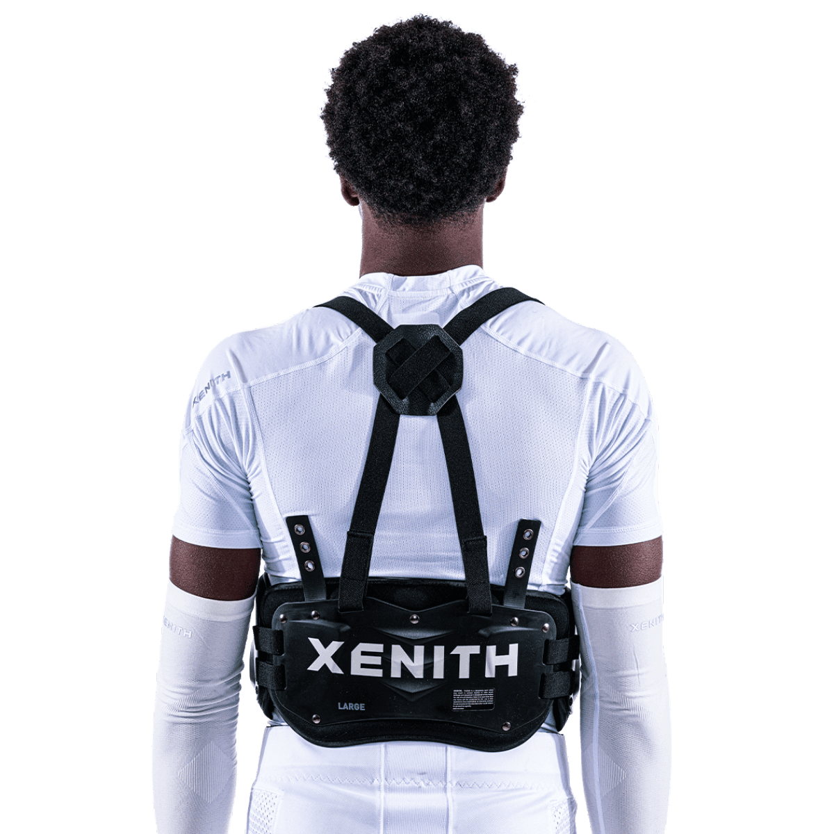 Varsity athlete wearing black Xenith core guard with black adjustment straps over shoulders.
