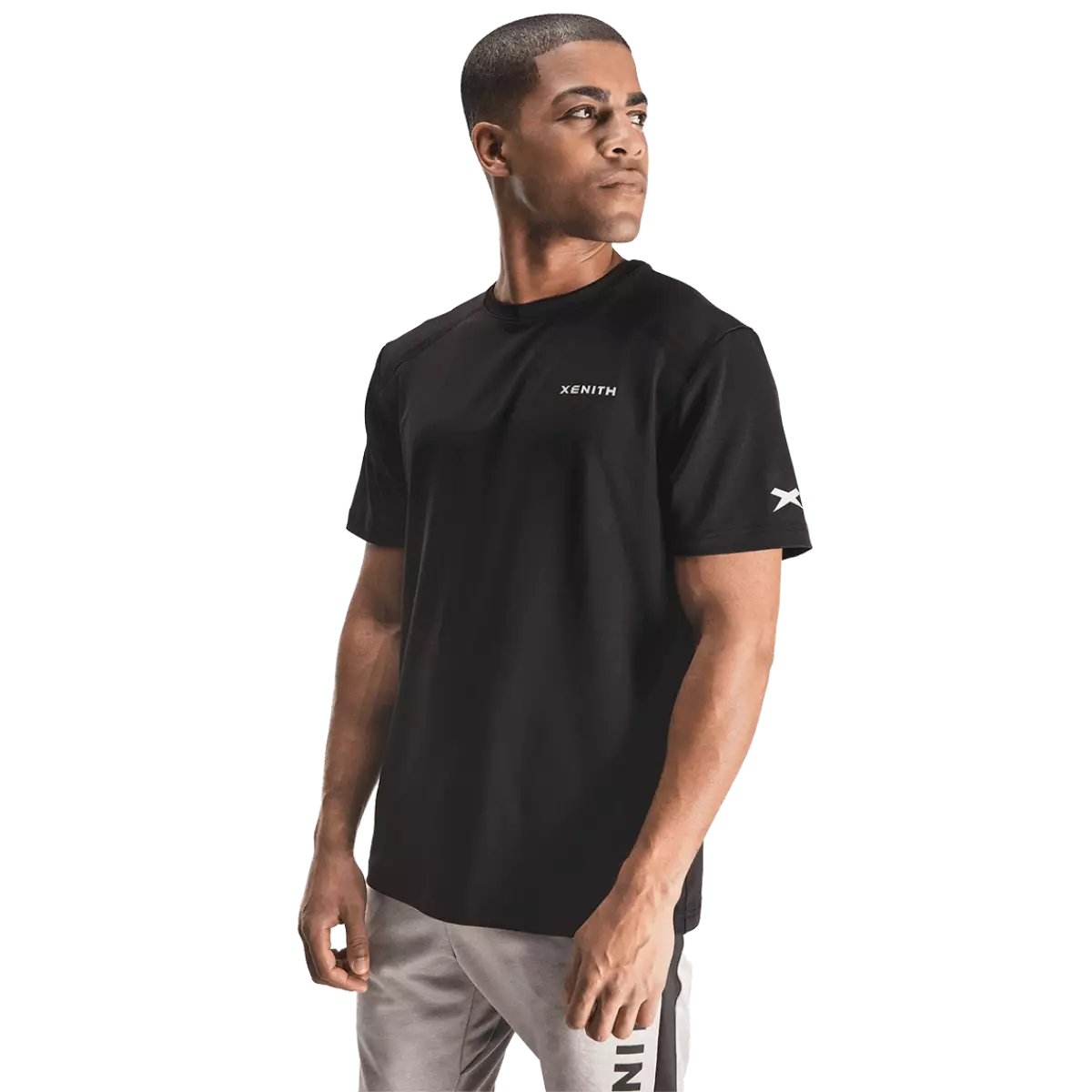 Male model wearing black t-shirt with white Xenith wordmark on left breast.