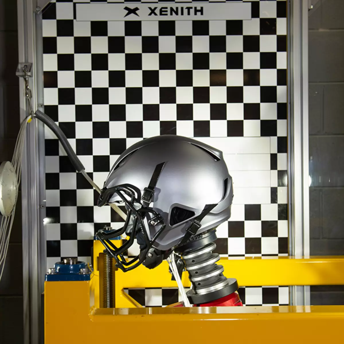 A pneumatic RAM testing of a Xenith football helmet.