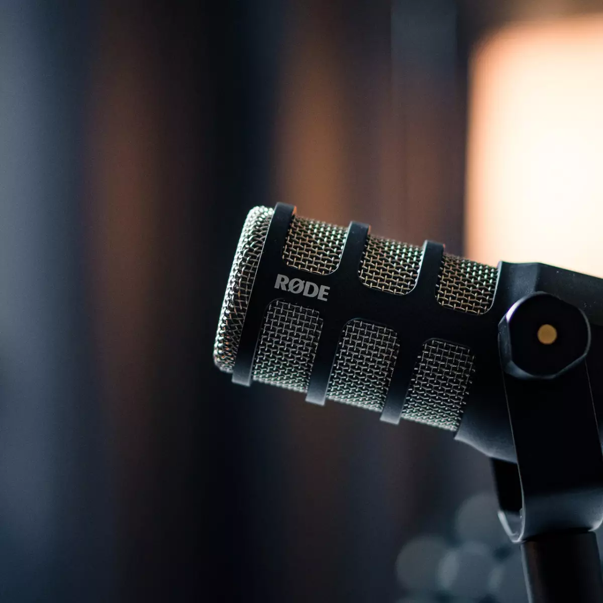 Close up side view of a podcast microphone.