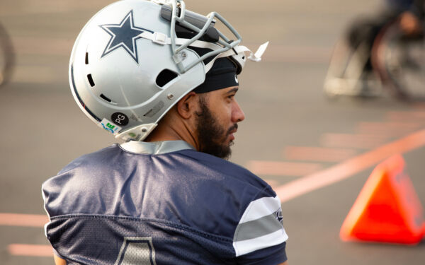 Close up from behind of a player looking to his right while wearing a Xenith helmet.