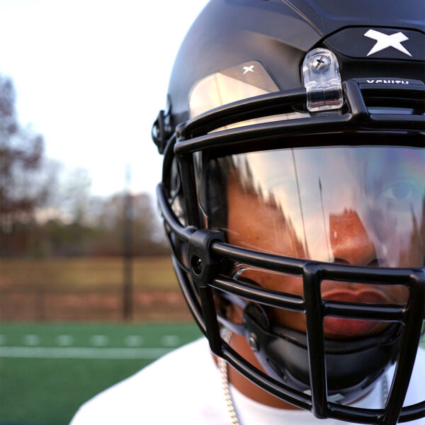 Close-up front view of Tyler Atkinson wearing a Xenith helmet.