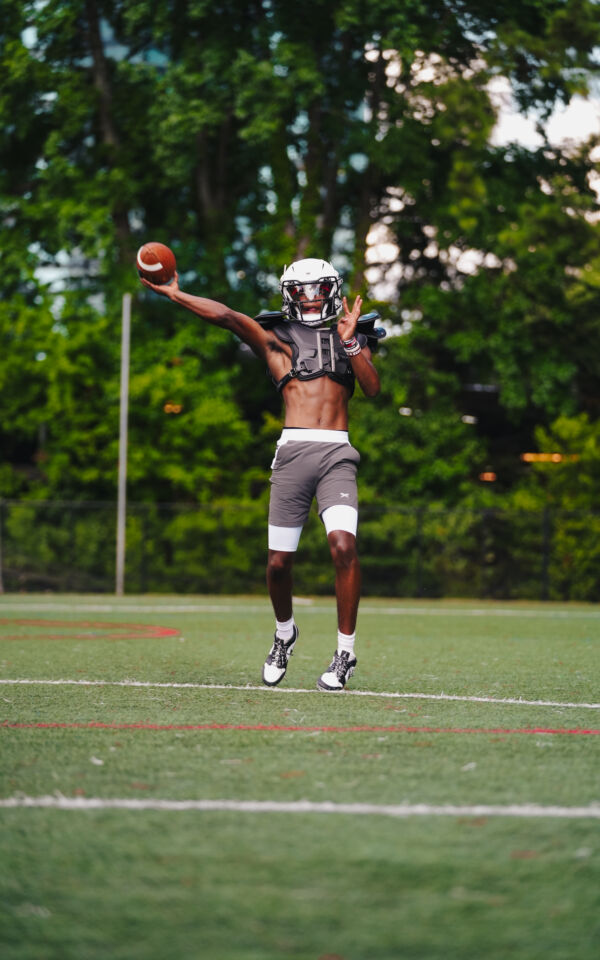 Prince throwing the football.