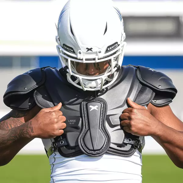 Close up of player wearing Xenith Velocity 2 football shoulder pads.