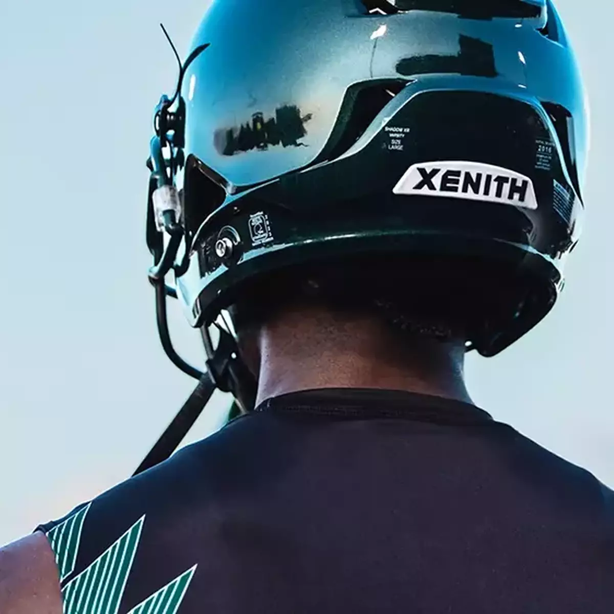 back of a green xenith shadow helmet